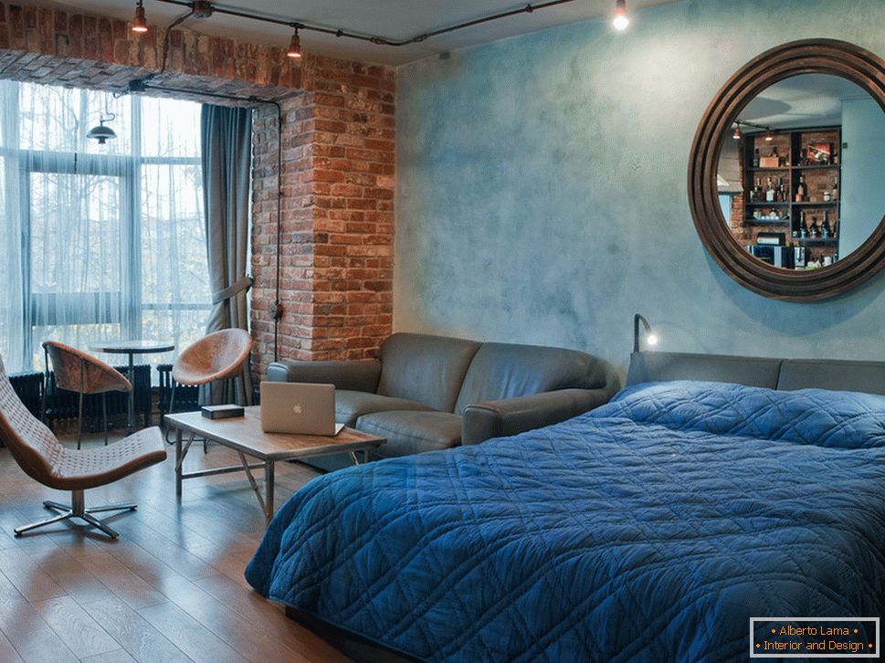 Un dormitor într-un apartament în stil loft