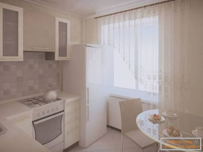 Un spațiu mic de bucătărie poate fi extins vizual, folosind exclusiv alb pentru decorare. 