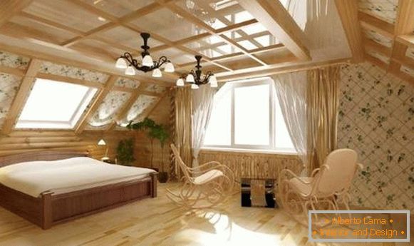 Designul interior al mansardei într-o casă din lemn