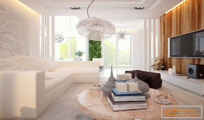 Interiorul livingului într-un stil modern de înaltă tehnologie. Un minim de decor decorativ, tehnologia modernă și designul futurist al decorului. 