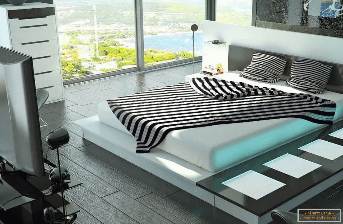 Dormitor cu un pat mare cu iluminat de înaltă tehnologie