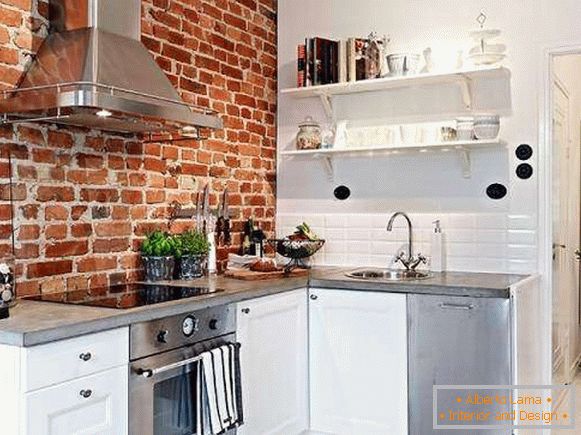 Designul bucătăriei în stil loft - fotografie cu zid de cărămidă roșie