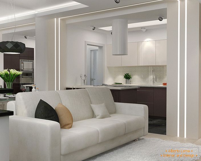 Un mic living în stilul minimalismului în apartamentul studio. Funcționalitatea și atractivitatea interioară în acest stil îl face de neînlocuit atunci când vine vorba de amenajarea unui spațiu rezidențial mic.