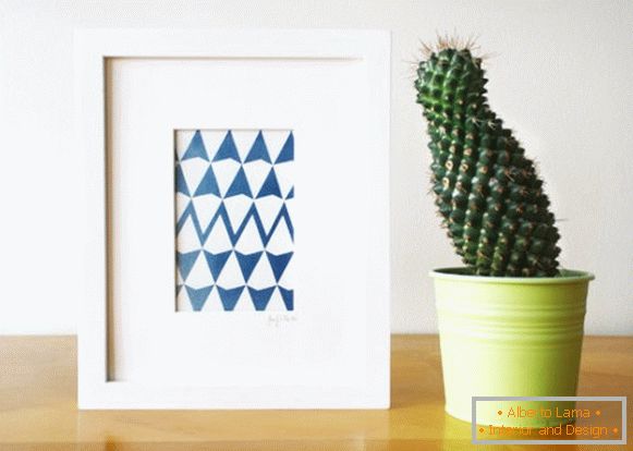 O imagine cu o imprimare geometrică și un cactus