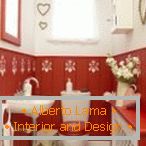 Stil romantic în designul toaletei roșii și albe