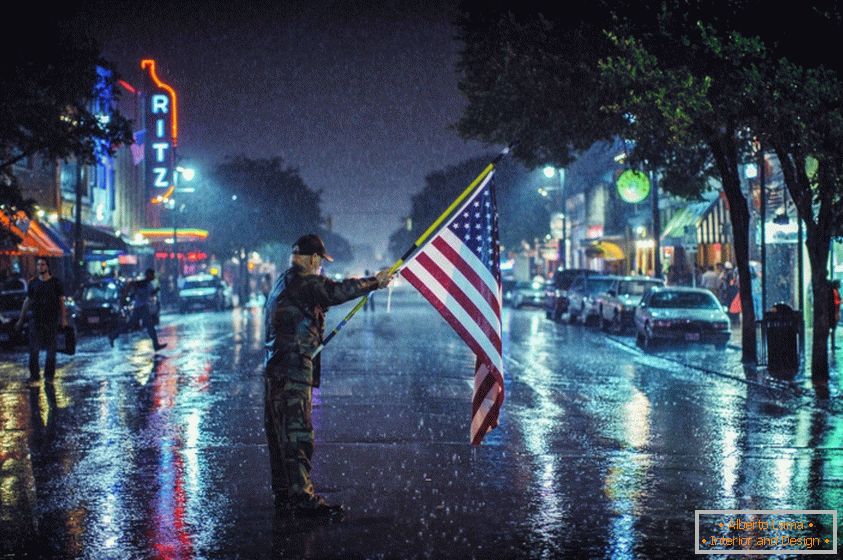 Patriot american cu pavilion în aer liber în ploaie