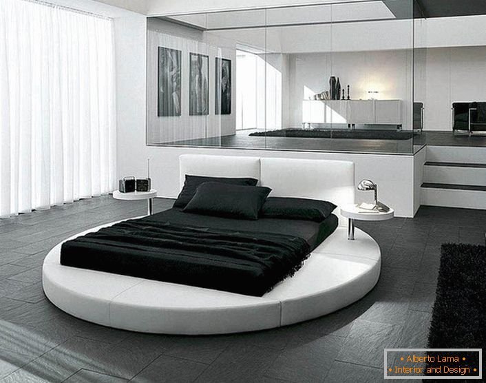 Designul dormitorului în stilul minimalismului este evidențiat de mobilierul selectat în mod corespunzător. Un detaliu interesant al interiorului este un pat rotund.