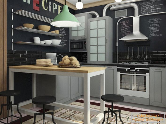 Bucătărie în stil loft într-un apartament mic de designer începător.