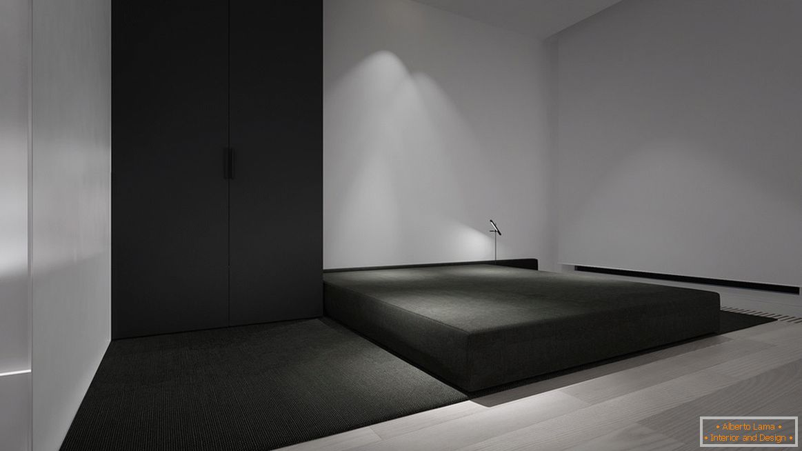 Un dormitor în stilul minimalismului este cel mai strălucit exemplu de caracteristică de design. Caracteristica principală este un minim de mobilier.