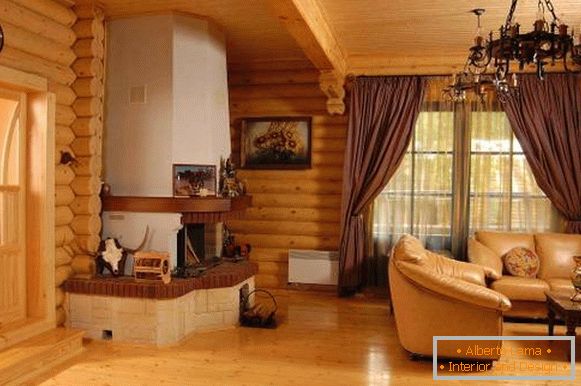 Interiorul modern al unei case din lemn din bușteni interior - fotografie