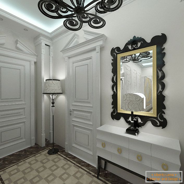 Stilul Art deco îi plac nuanțele luminoase în interior. Intrarea, decorată în alb, este notabilă pentru elemente decorative selectate corect.