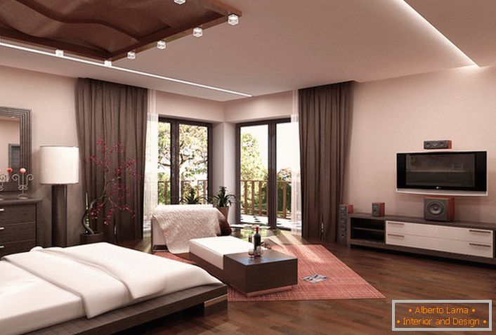 Un dormitor spațios, în stil high-tech, în tonuri bej, în casa unei tinere familii din Roma.