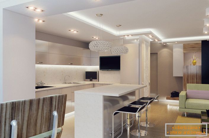 Un apartament studio confortabil este încadrat în mod corespunzător din punct de vedere al stilului. Un design atractiv, memorabil din punct de vedere vizual al livingului, combinat cu bucătăria, este de asemenea practic și funcțional.