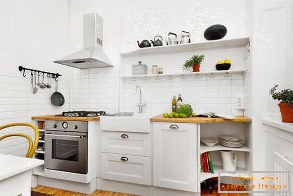 Фото необычного șiнтерьера кухнși в белом цвете