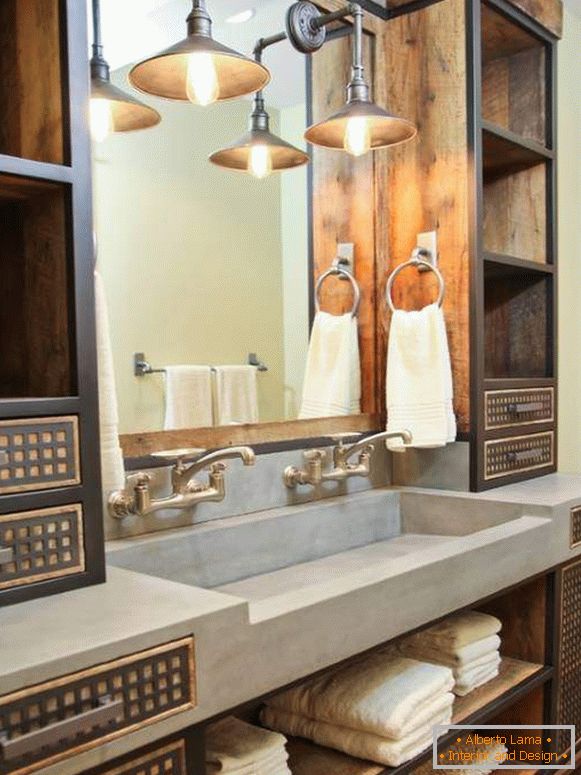 O frumoasă bordură sub chiuvetă cu dulapuri în stilul unui mansardă pentru baie