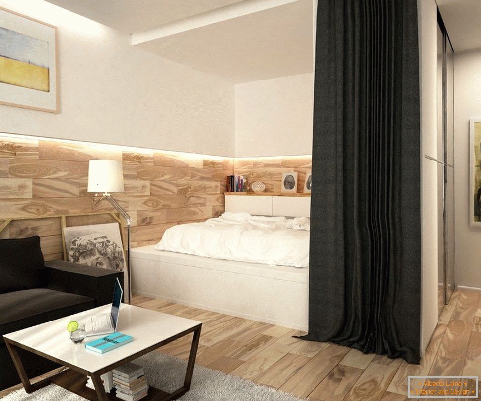 Interiorul unei camere cu o nișă într-un apartament cu o cameră